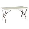 A picture of white fold up table on side